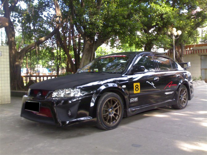 三菱蓝瑟改装大包围 小包价格_三菱蓝瑟改装大